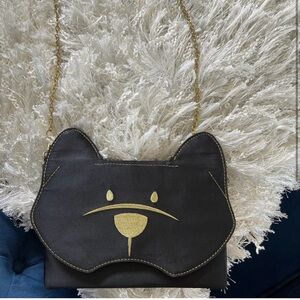 BCBGMaxAzria Black and Gold Crossbody Bag